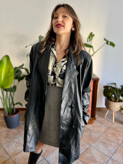 1980's vintage oversize black leather jacket with asymmetrical buttons