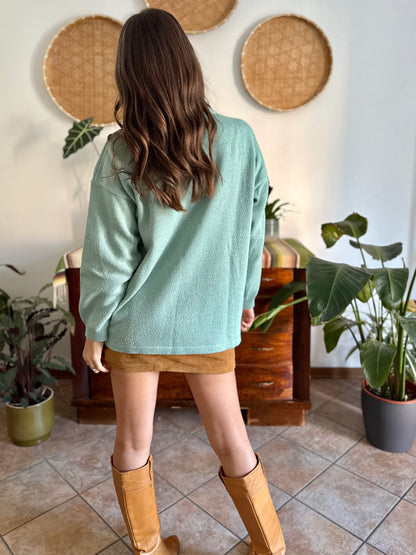 1980's vintage wool turquoise knit pullover with tan floral pattern