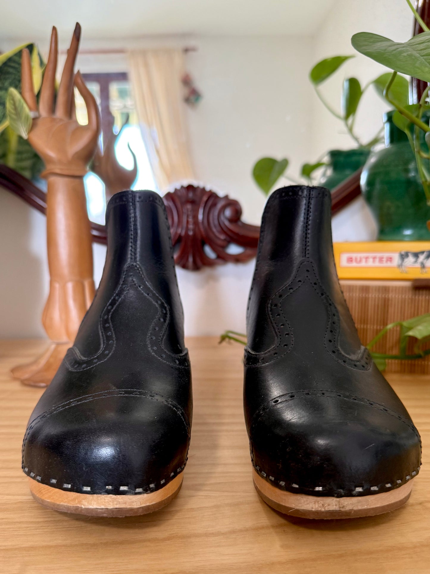 Black leather Swedish Haskbeen bottles with tooled leather detailing