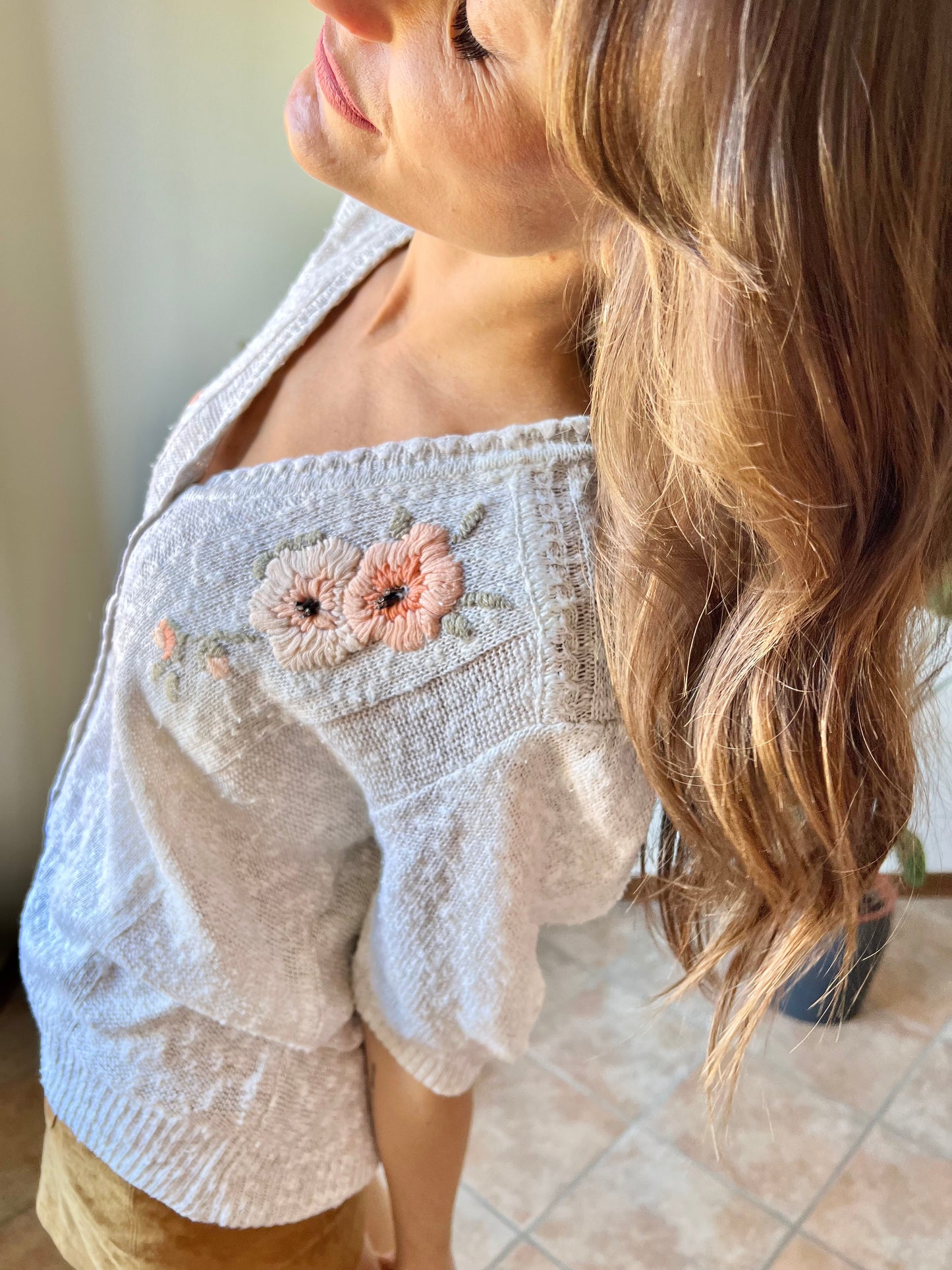 1970's vintage oatmeal knit cardigan top with peach floral embroidery with glass bead details