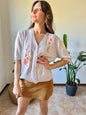 1970's vintage oatmeal knit cardigan top with peach floral embroidery with glass bead details