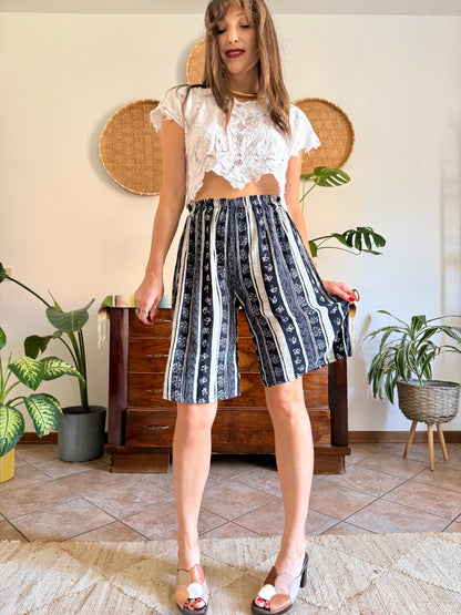 1990's vintage black and tan striped shorts with floral and butterfly print