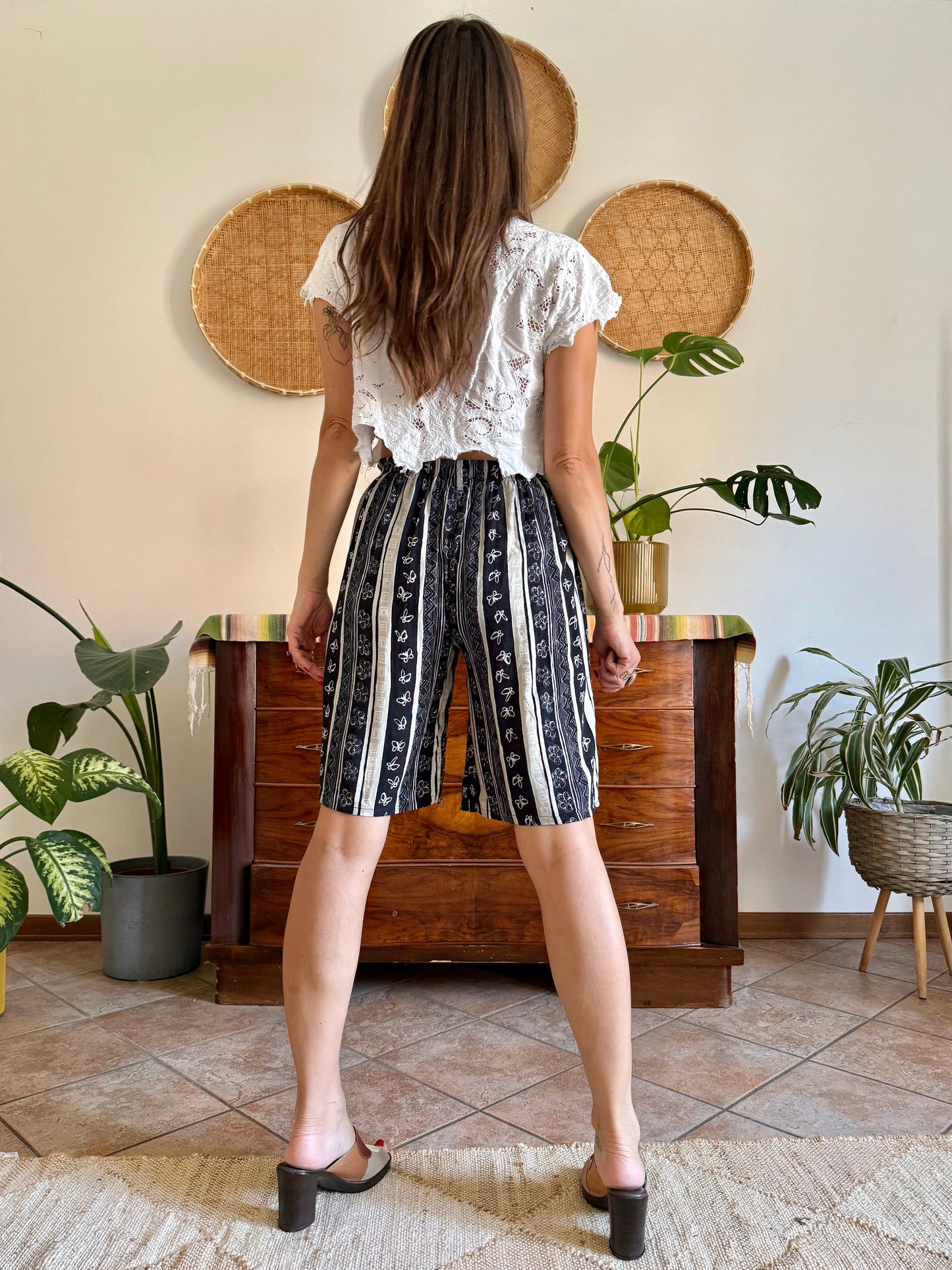 1990's vintage black and tan striped shorts with floral and butterfly print