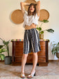 1990's vintage black and tan striped shorts with floral and butterfly print