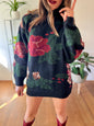 1970's vintage black hand knit pullover with burgundy and green floral pattern