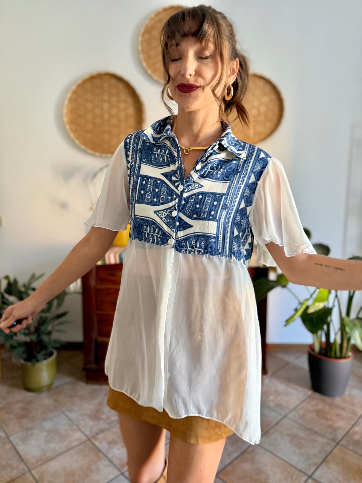 1990's vintage blue and cream geometric print blouse with sheer cream paneling and sleeves