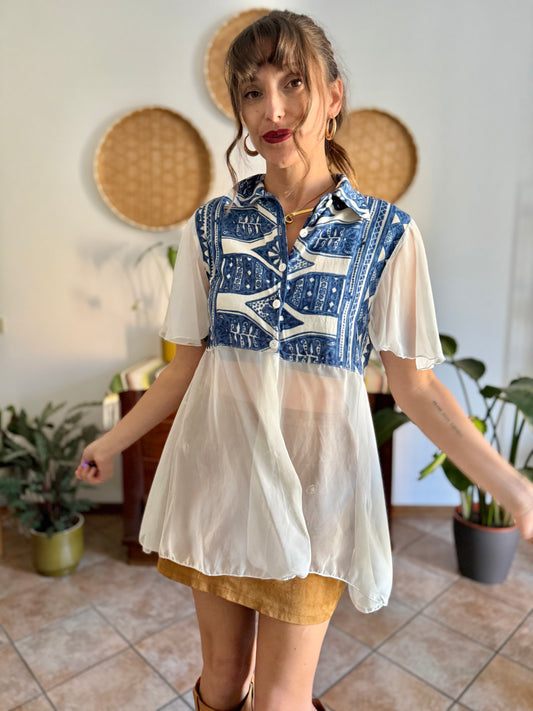 1990's vintage blue and cream geometric print blouse with sheer cream paneling and sleeves