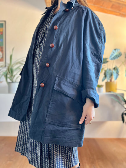 1970's vintage navy blue trench coat with red plaid lining