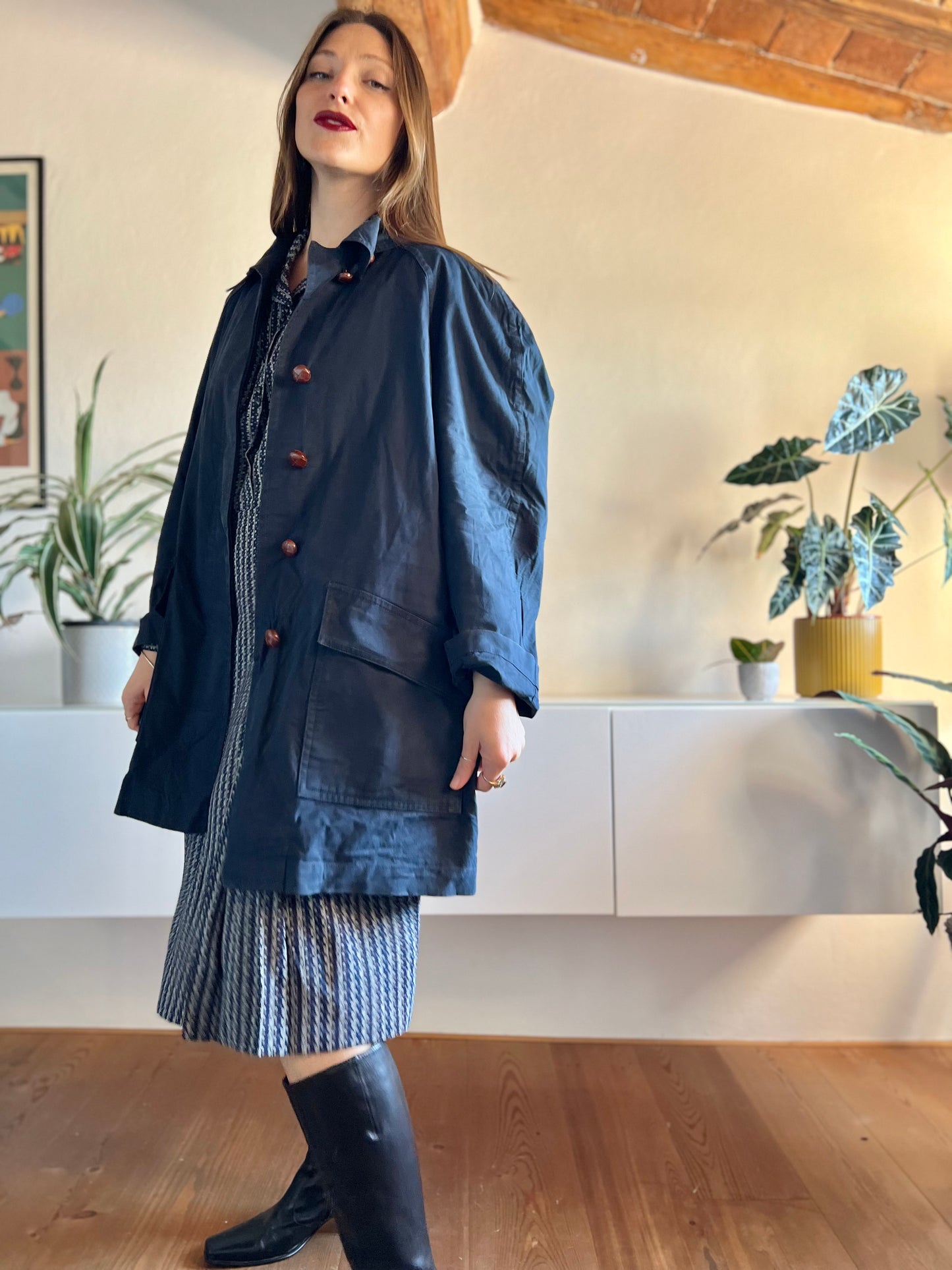 1970's vintage navy blue trench coat with red plaid lining