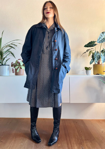 1970's vintage navy blue trench coat with red plaid lining