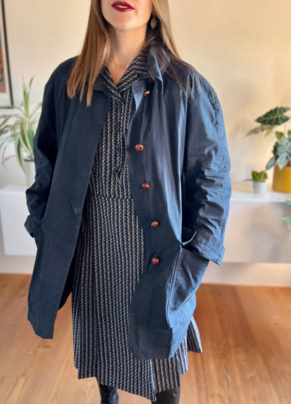 1970's vintage navy blue trench coat with red plaid lining