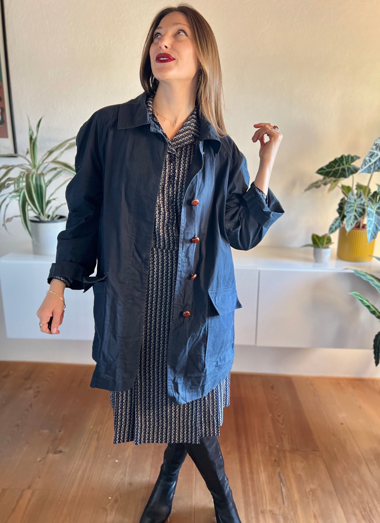 1970's vintage navy blue trench coat with red plaid lining