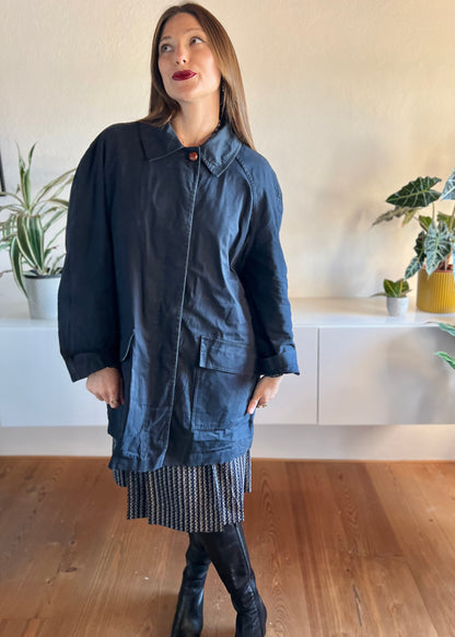 1970's vintage navy blue trench coat with red plaid lining