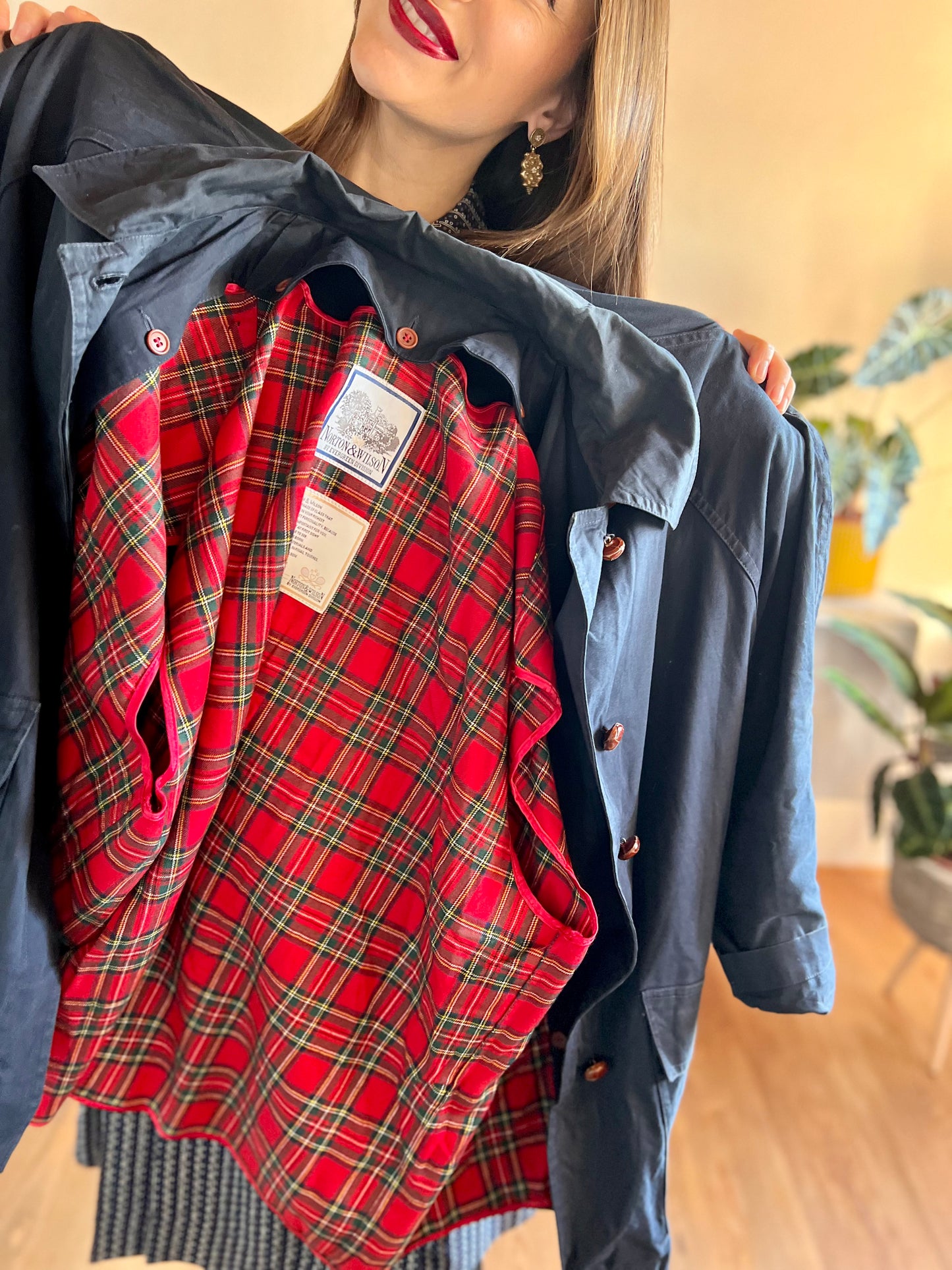 1970's vintage navy blue trench coat with red plaid lining