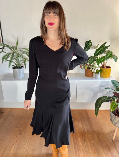 1970's vintage black bias cut midi dress with trumpet ruffle hem