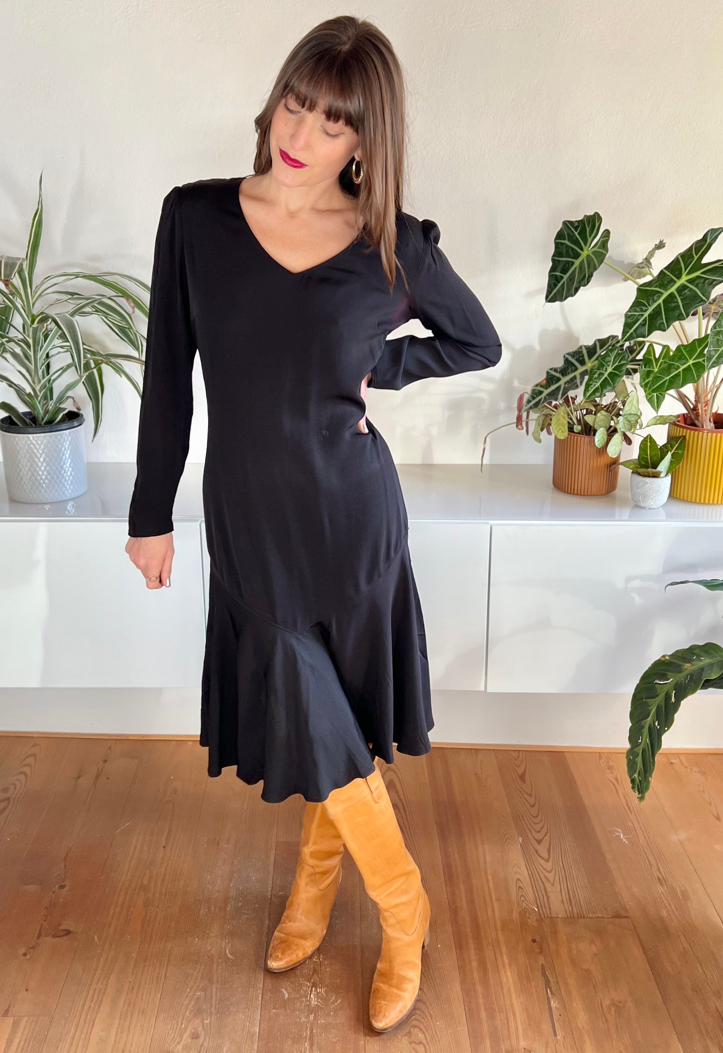 1970's vintage black bias cut midi dress with trumpet ruffle hem