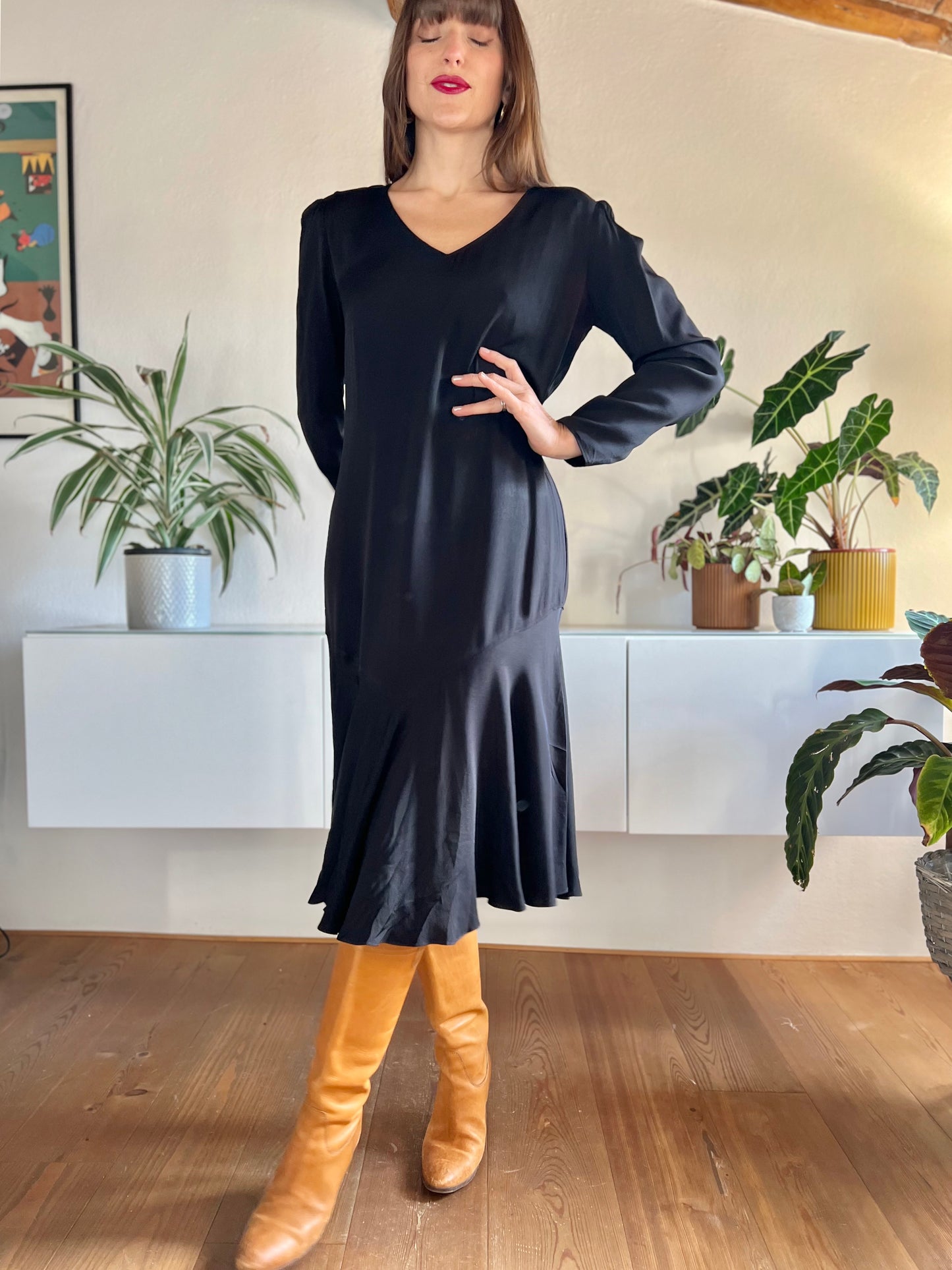 1970's vintage black bias cut midi dress with trumpet ruffle hem