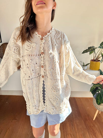 1970's vintage cream knit cream cardigan with rainbow speckles and 3d knot flowers