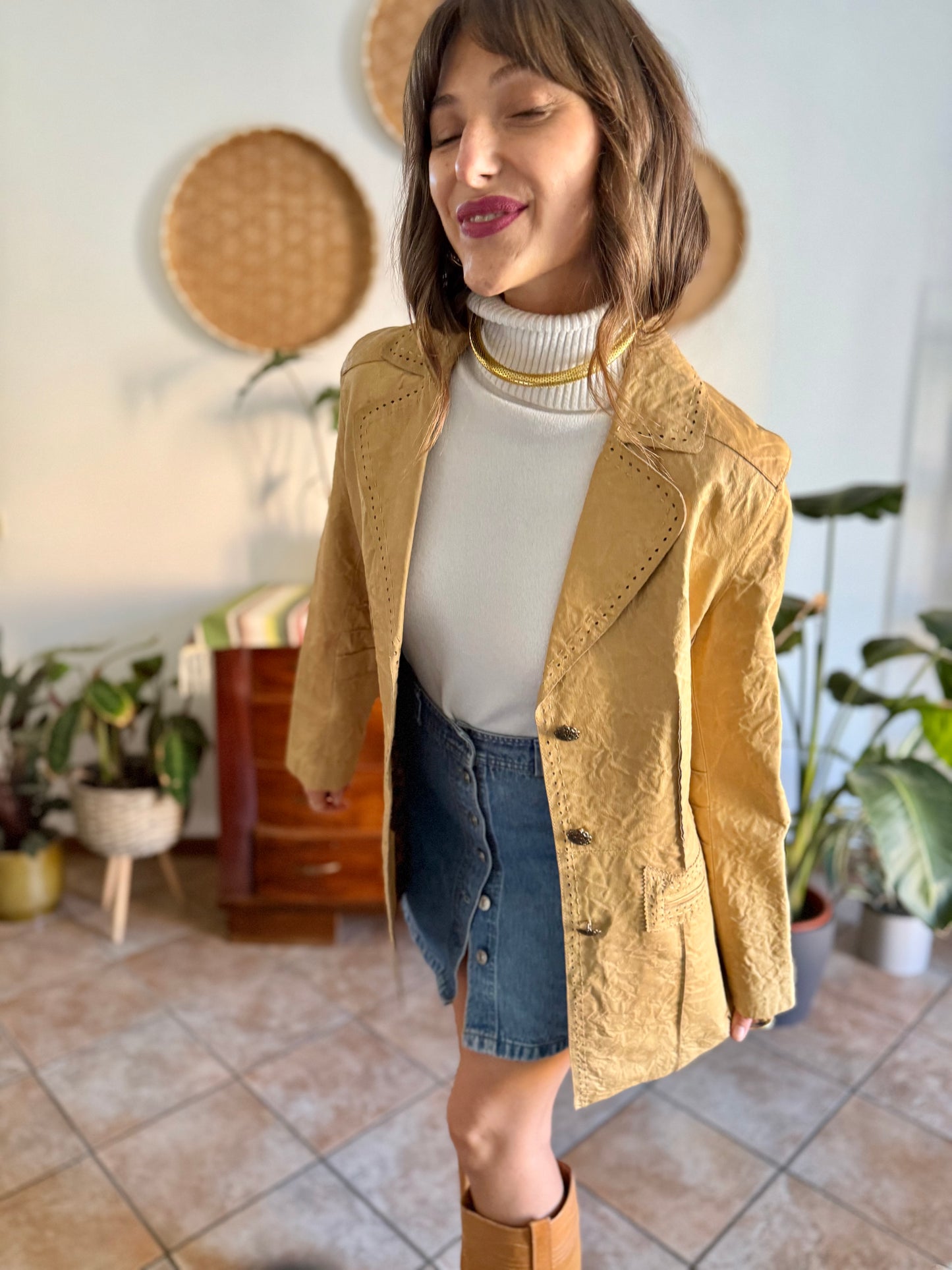 1990's vintage beige leather jacket with animal print lining