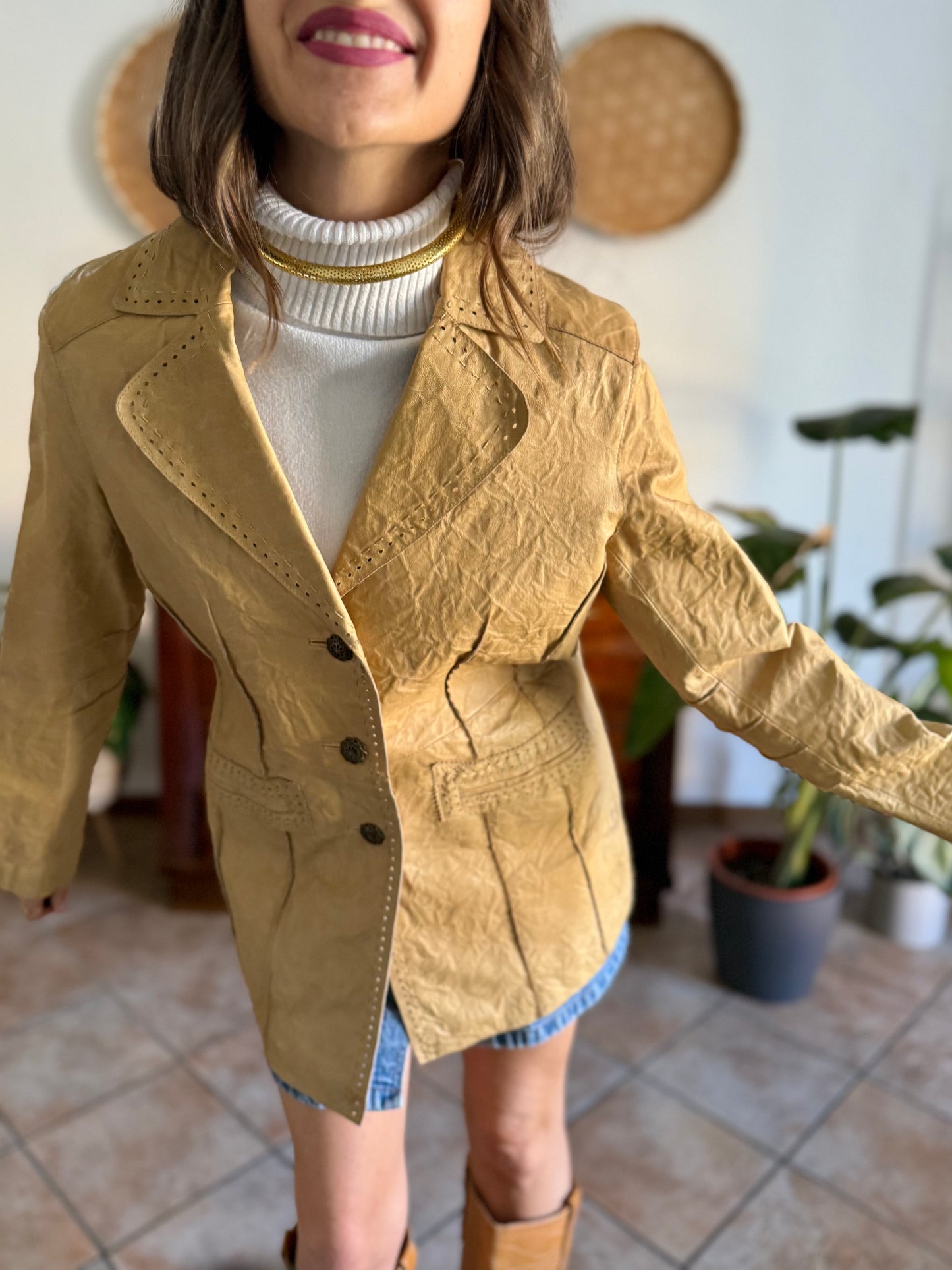 1990's vintage beige leather jacket with animal print lining