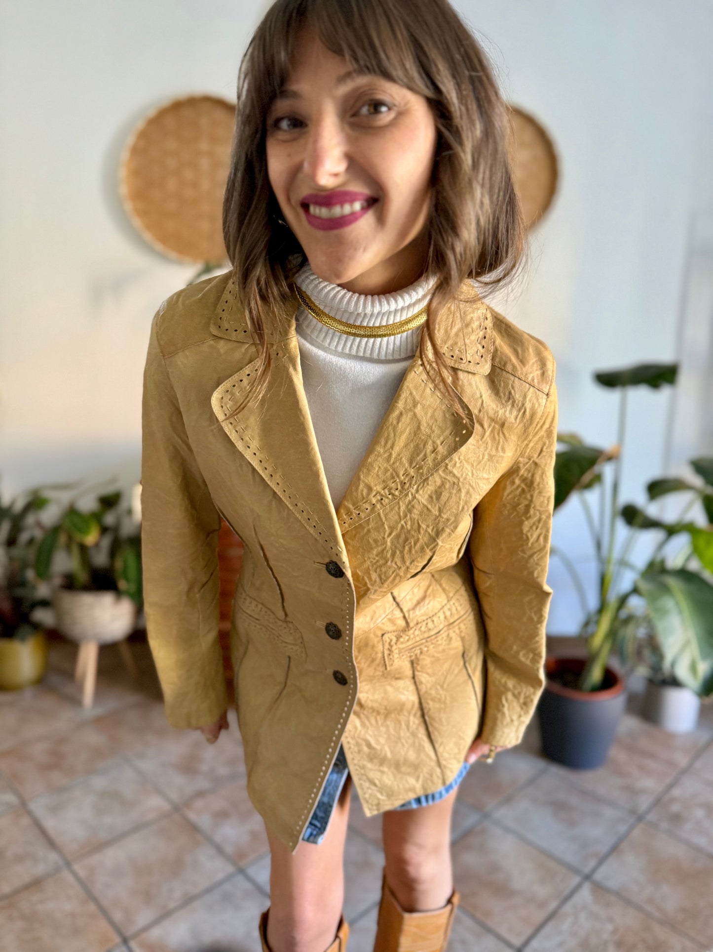 1990's vintage beige leather jacket with animal print lining