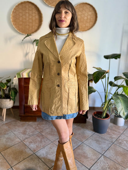 1990's vintage beige leather jacket with animal print lining
