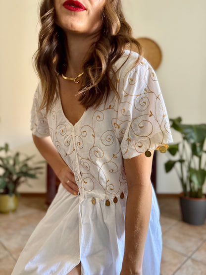 1970’s vintage white cotton prairie midi dress with gold floral embroidery and brass coin detailing