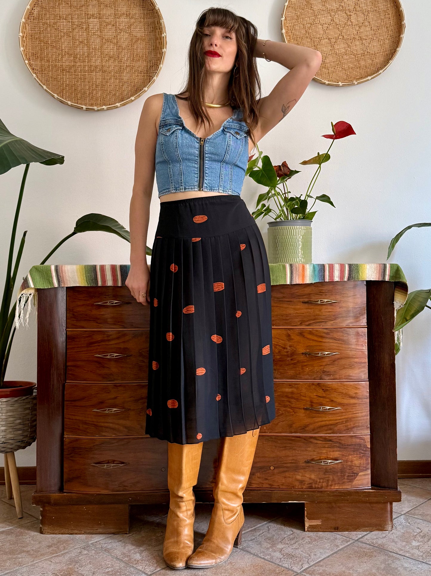 1990's vintage semi sheer black pleated midi skirt with orange polka dot print