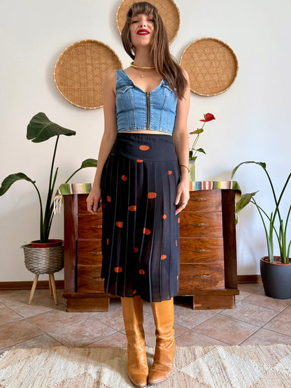 1990's vintage semi sheer black pleated midi skirt with orange polka dot print