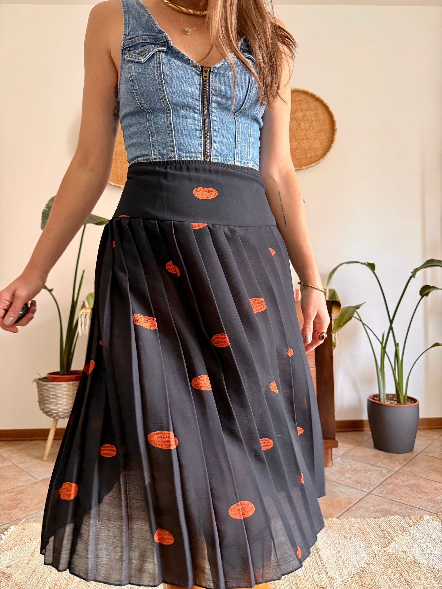 1990's vintage semi sheer black pleated midi skirt with orange polka dot print