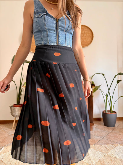 1990's vintage semi sheer black pleated midi skirt with orange polka dot print