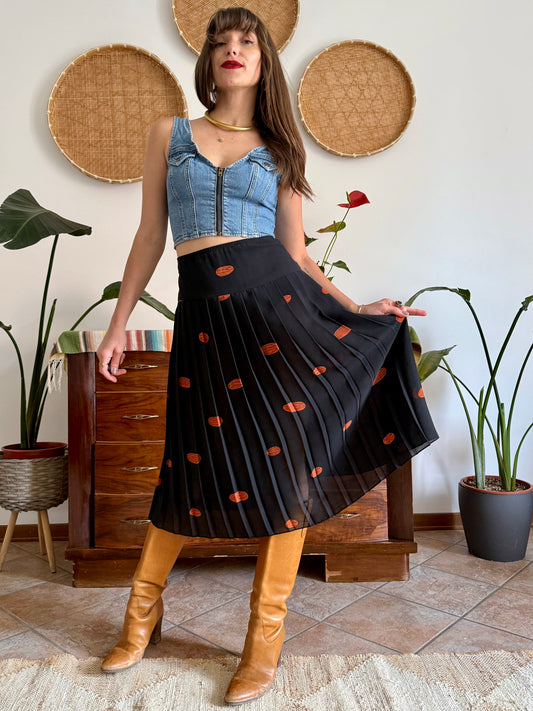 1990's vintage semi sheer black pleated midi skirt with orange polka dot print