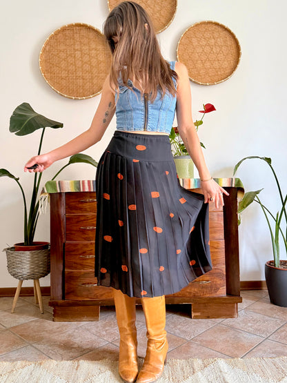 1990's vintage semi sheer black pleated midi skirt with orange polka dot print