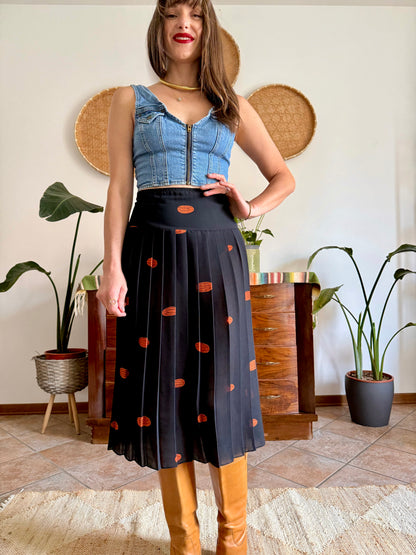 1990's vintage semi sheer black pleated midi skirt with orange polka dot print