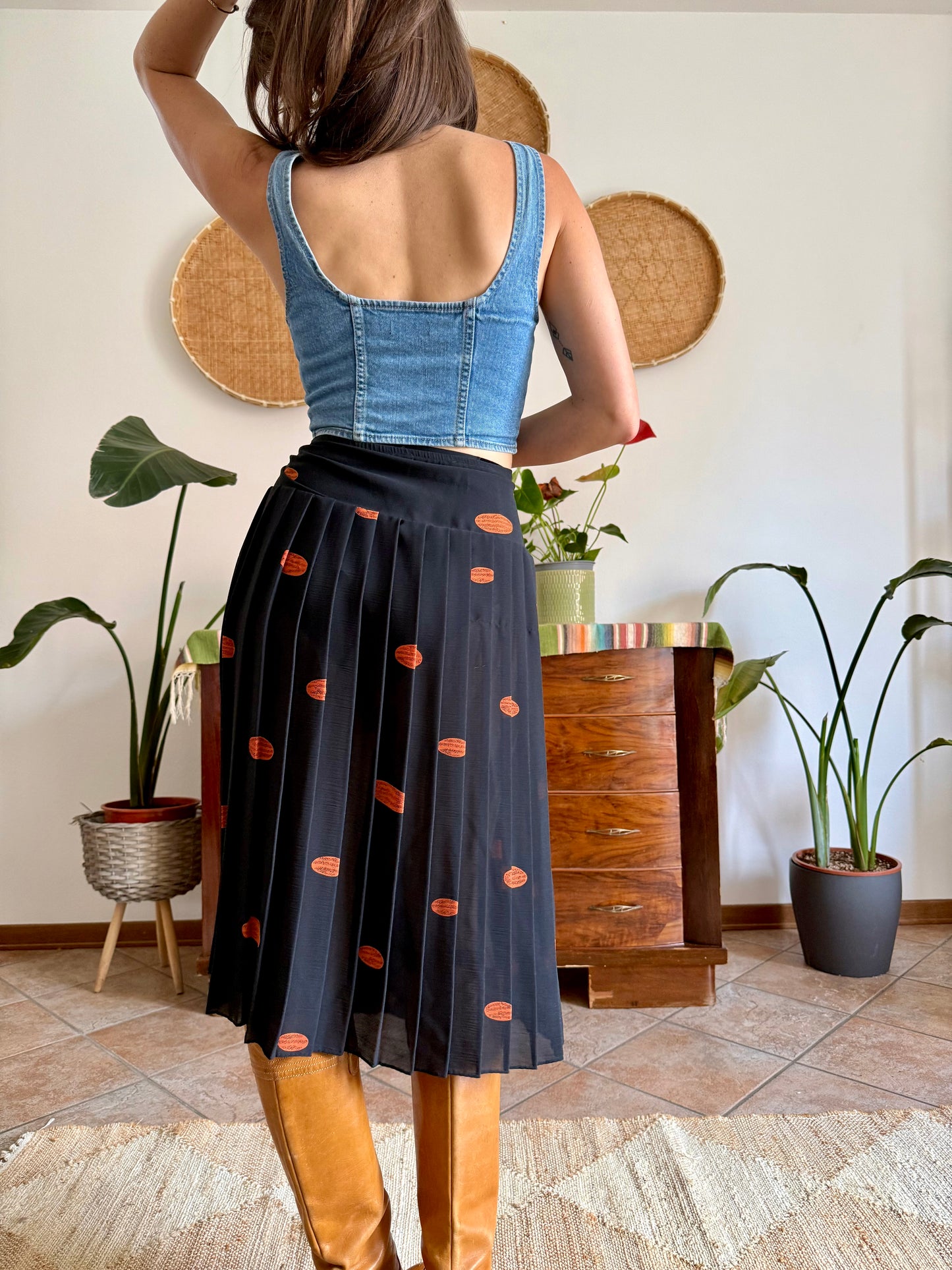 1990's vintage semi sheer black pleated midi skirt with orange polka dot print