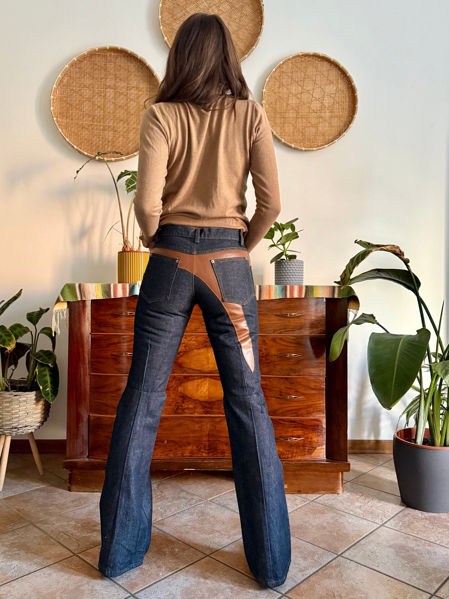 1990's vintage dark blue belle bottom jeans with tan faux leather panels