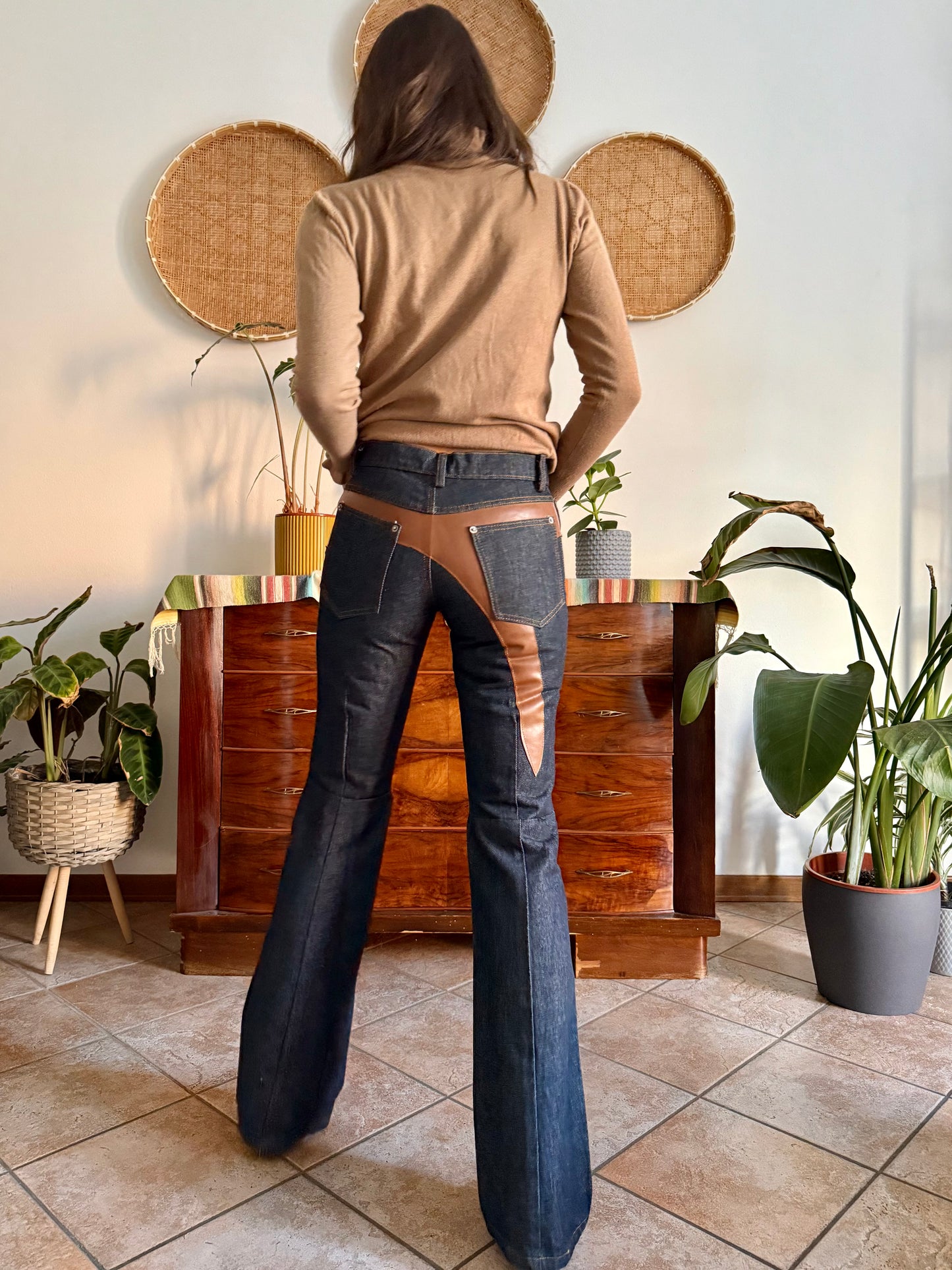 1990's vintage dark blue belle bottom jeans with tan faux leather panels