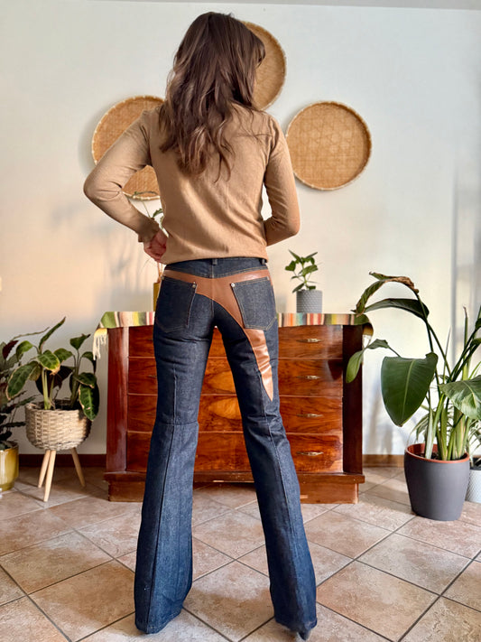 1990's vintage dark blue belle bottom jeans with tan faux leather panels