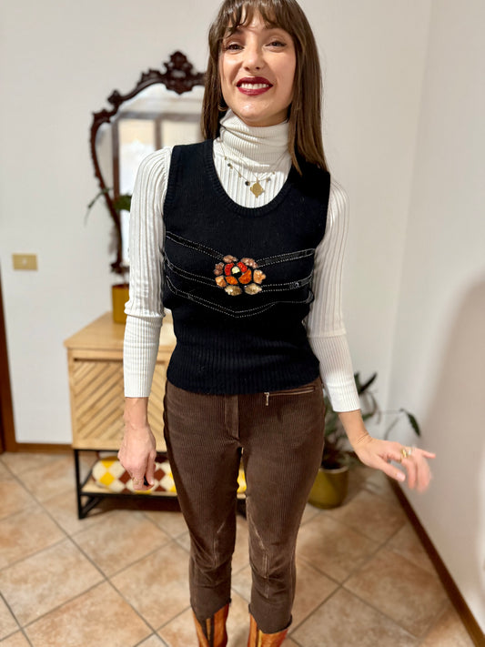 1970's vintage black wool knit vest with orange, coral, and cream sequin floral detailing