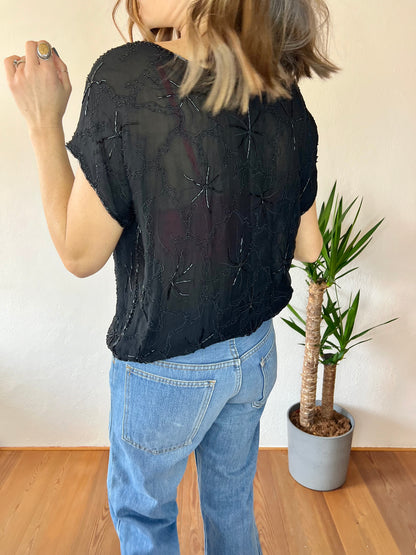 1970's vintage semi sheer black silk blouse with glass bead floral design