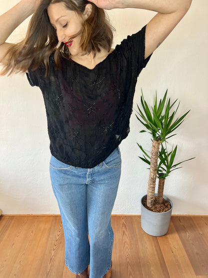 1970's vintage semi sheer black silk blouse with glass bead floral design