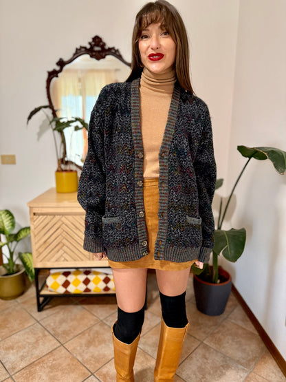 1990's vintage black wool cardigan with rainbow chevron pattern