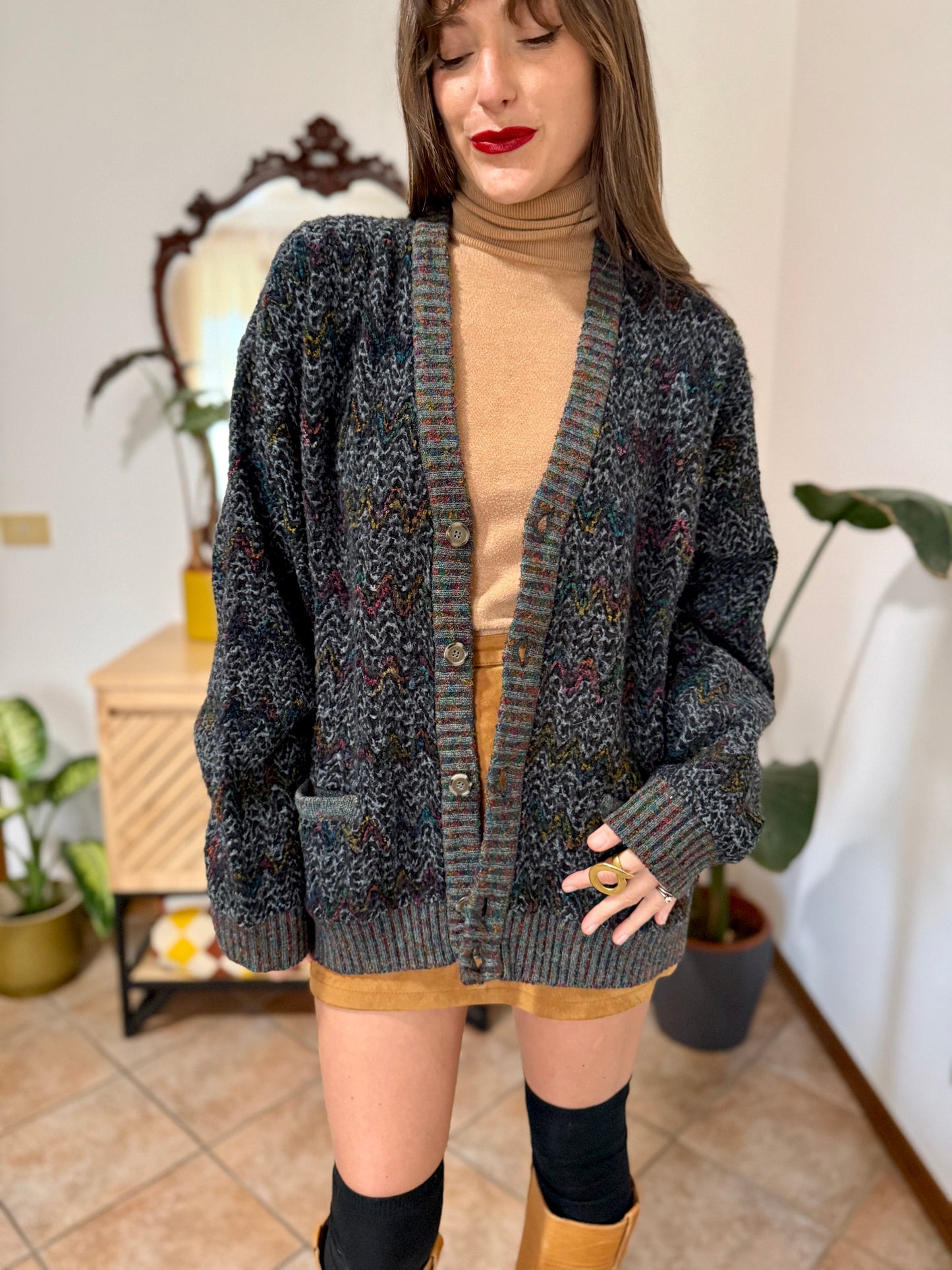 1990's vintage black wool cardigan with rainbow chevron pattern