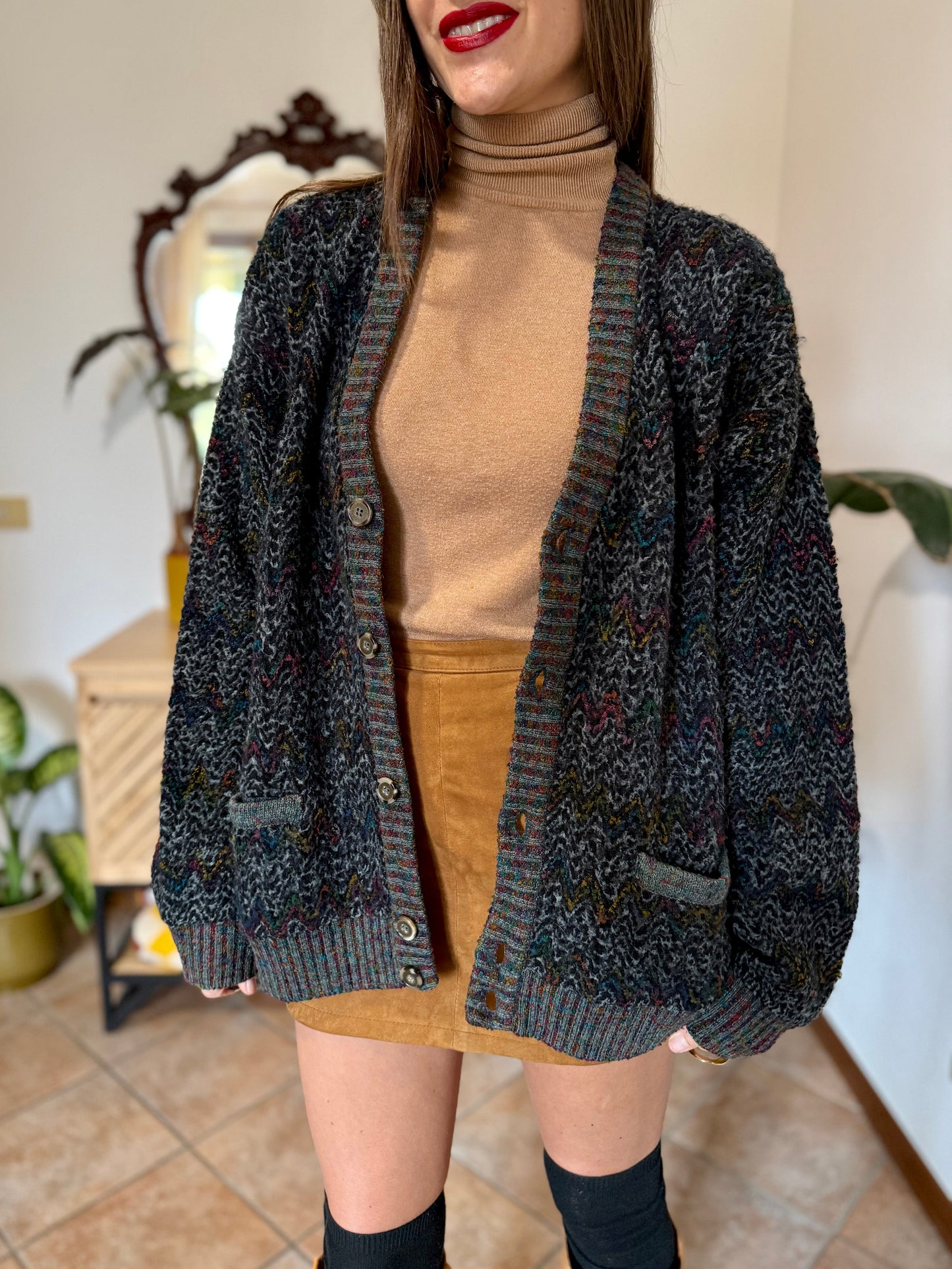 1990's vintage black wool cardigan with rainbow chevron pattern