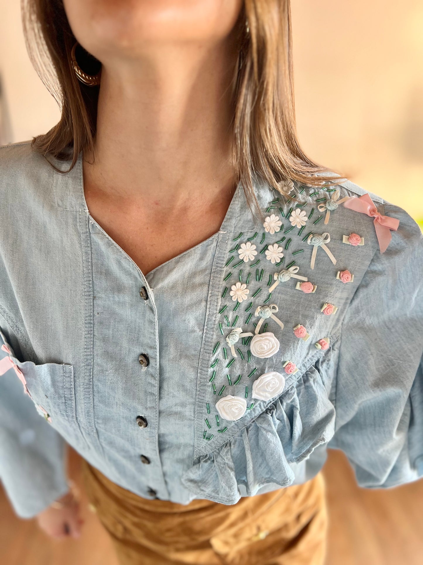 1980's vintage light blue denim shirt with floral ribbon and glass bead detailing