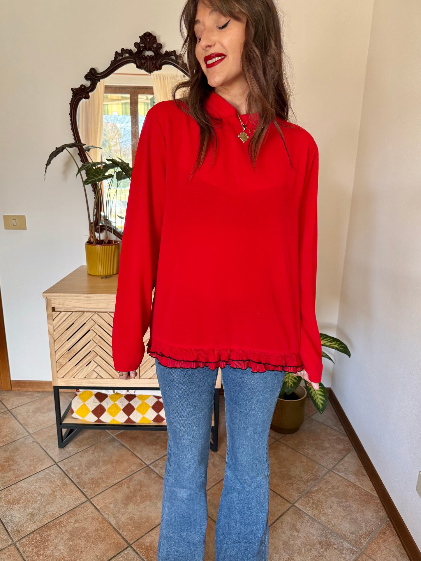 1980's vintage cherry red textured blouse with black ruffle hem