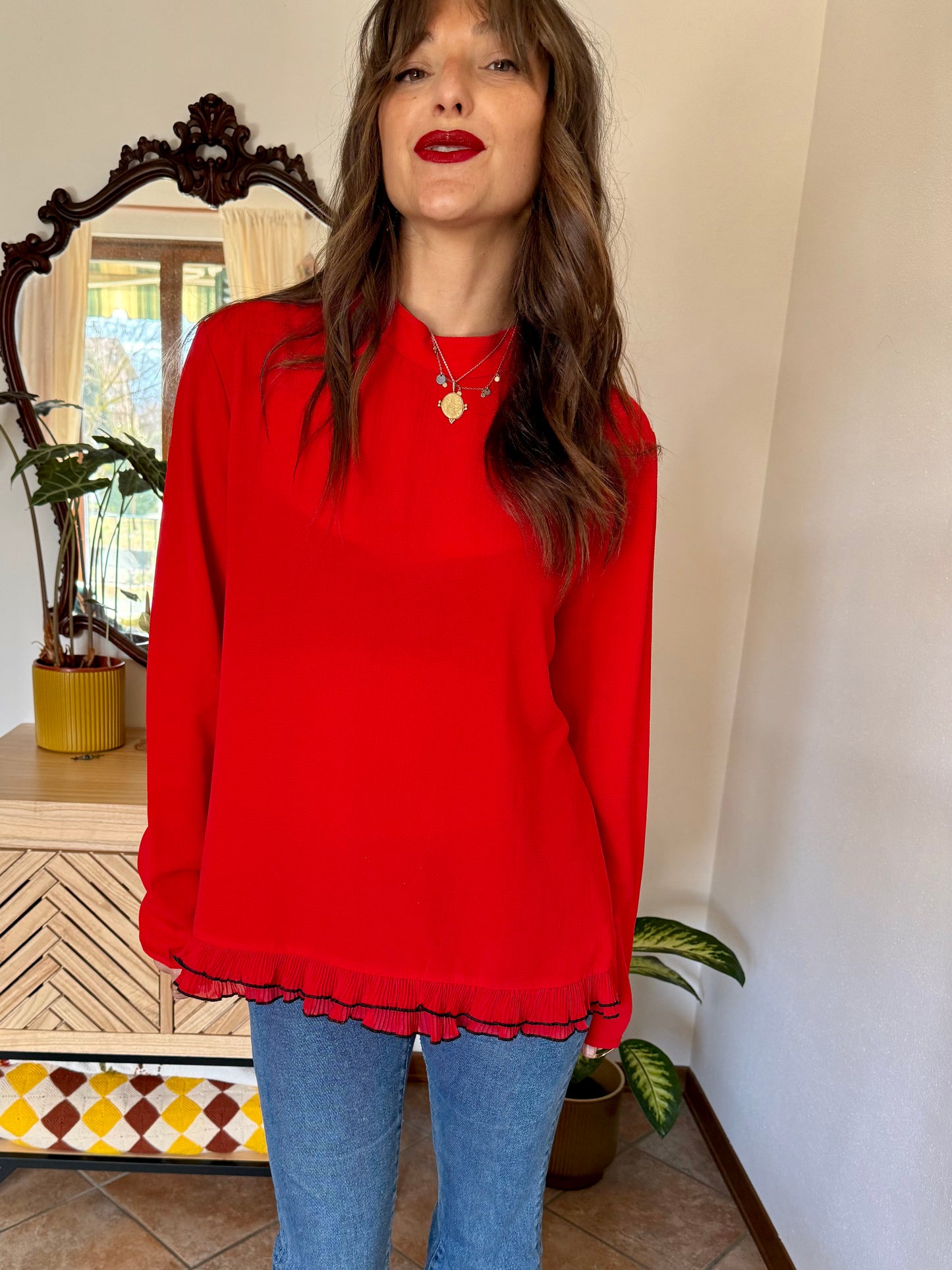 1980's vintage cherry red textured blouse with black ruffle hem