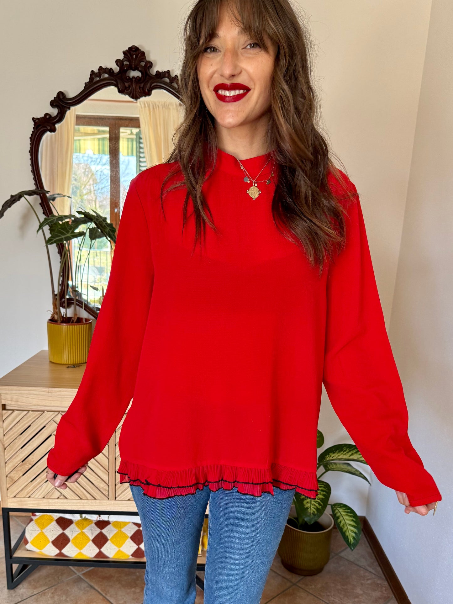 1980's vintage cherry red textured blouse with black ruffle hem