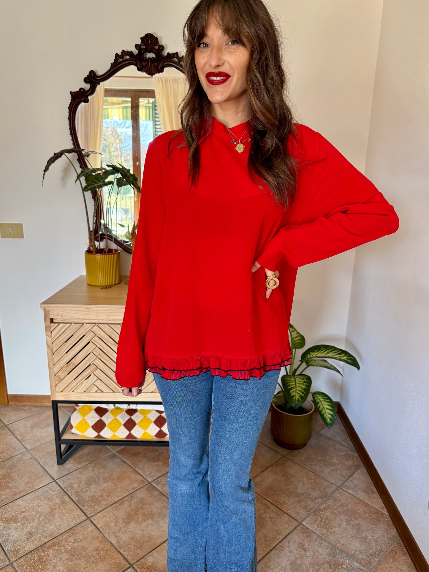 1980's vintage cherry red textured blouse with black ruffle hem