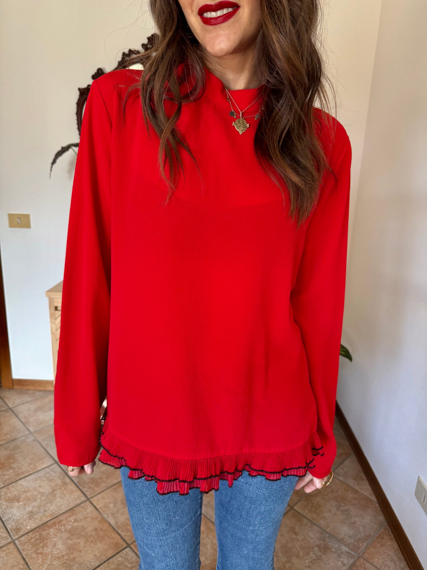 1980's vintage cherry red textured blouse with black ruffle hem